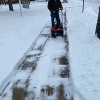 Snow blowing the walks